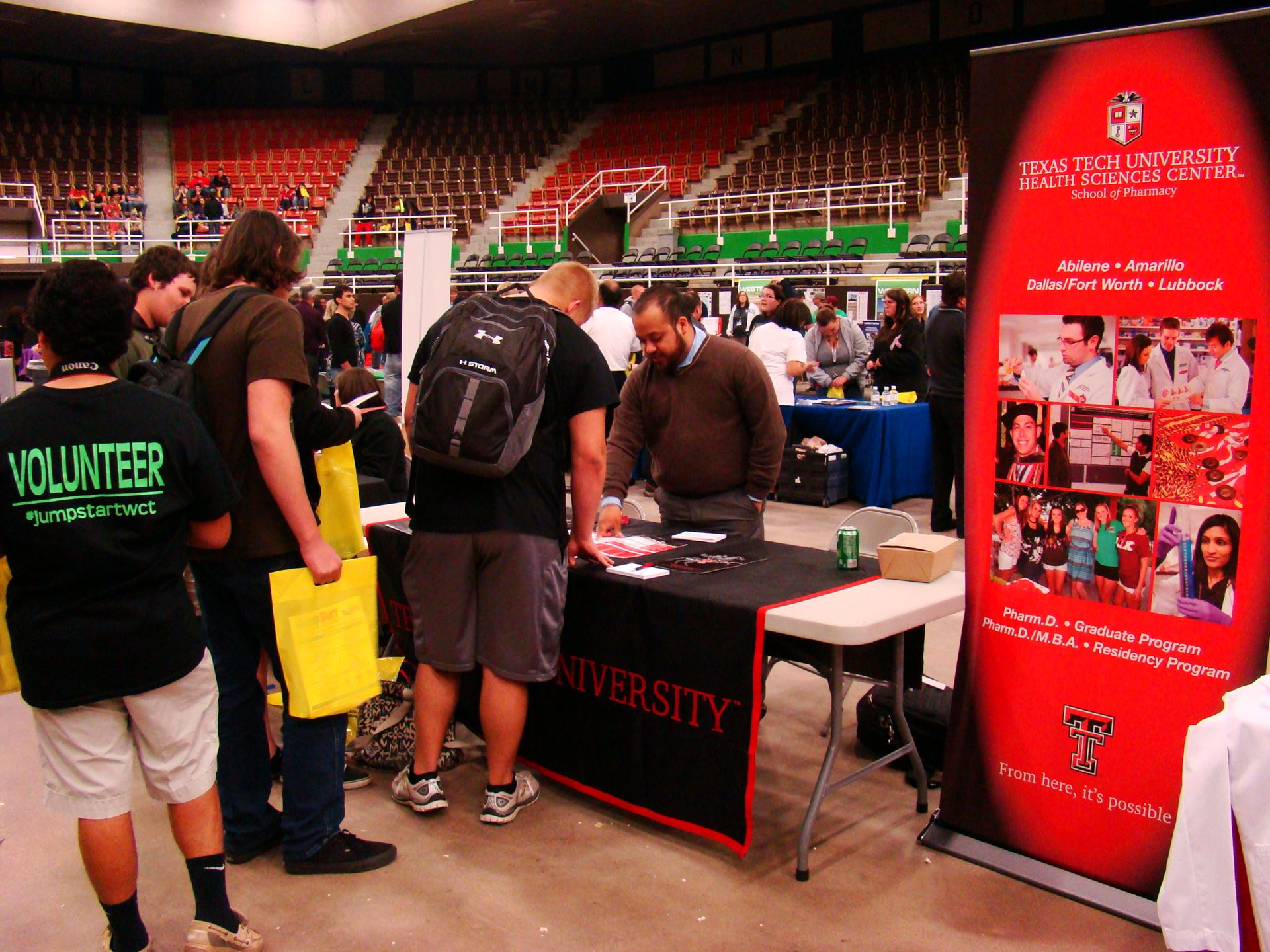 Students visit Texas Tech booth.